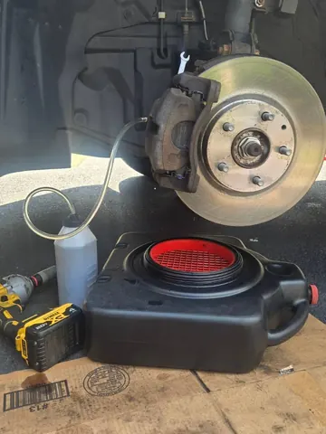 Mazda CX-5: Rear rotors, pads & brake flush