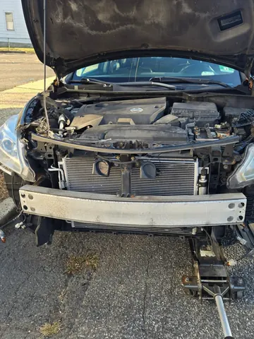 2013 Nissan Altima: Headlight replacement