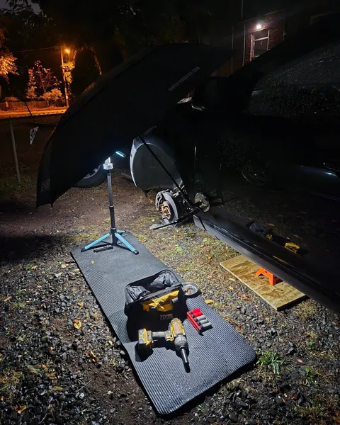 Ford Edge front brakes, done at night under work lights