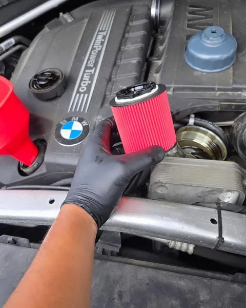 New oil filter going into a BMW X5